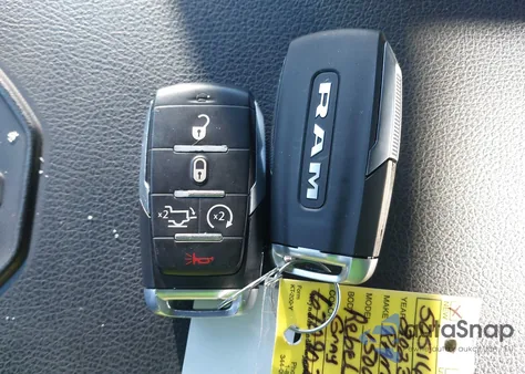 2023 Ram 1500 Rebel 4X4 5'7 Box z USA, uszkodzony, nr VIN 1C6SRFLT7PN670902